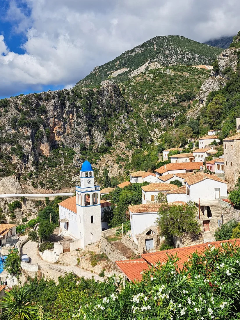 Panoramic view of Dhermi village and the Ionian Sea from Panagia Drymadon