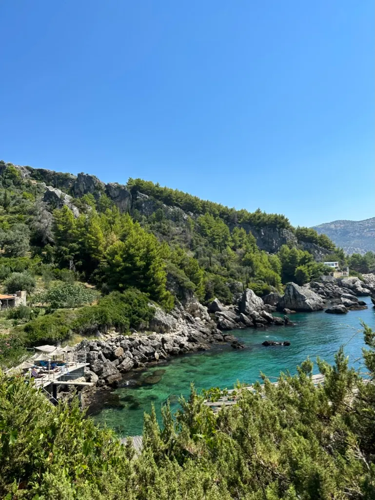 Rocky cove with crystal-clear turquoise water near Aquarium Beach south of Jale