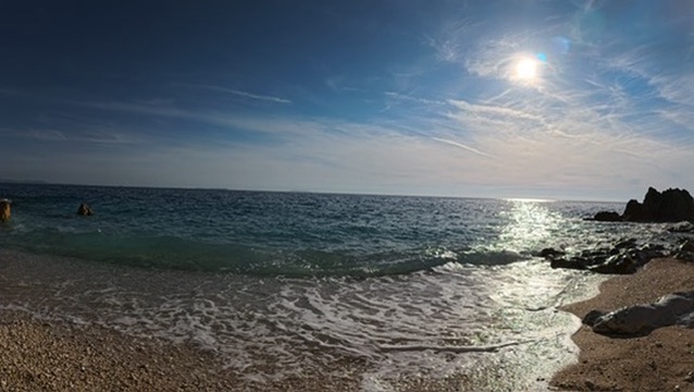 Tourist reviewing debit card and rental contract before pickup