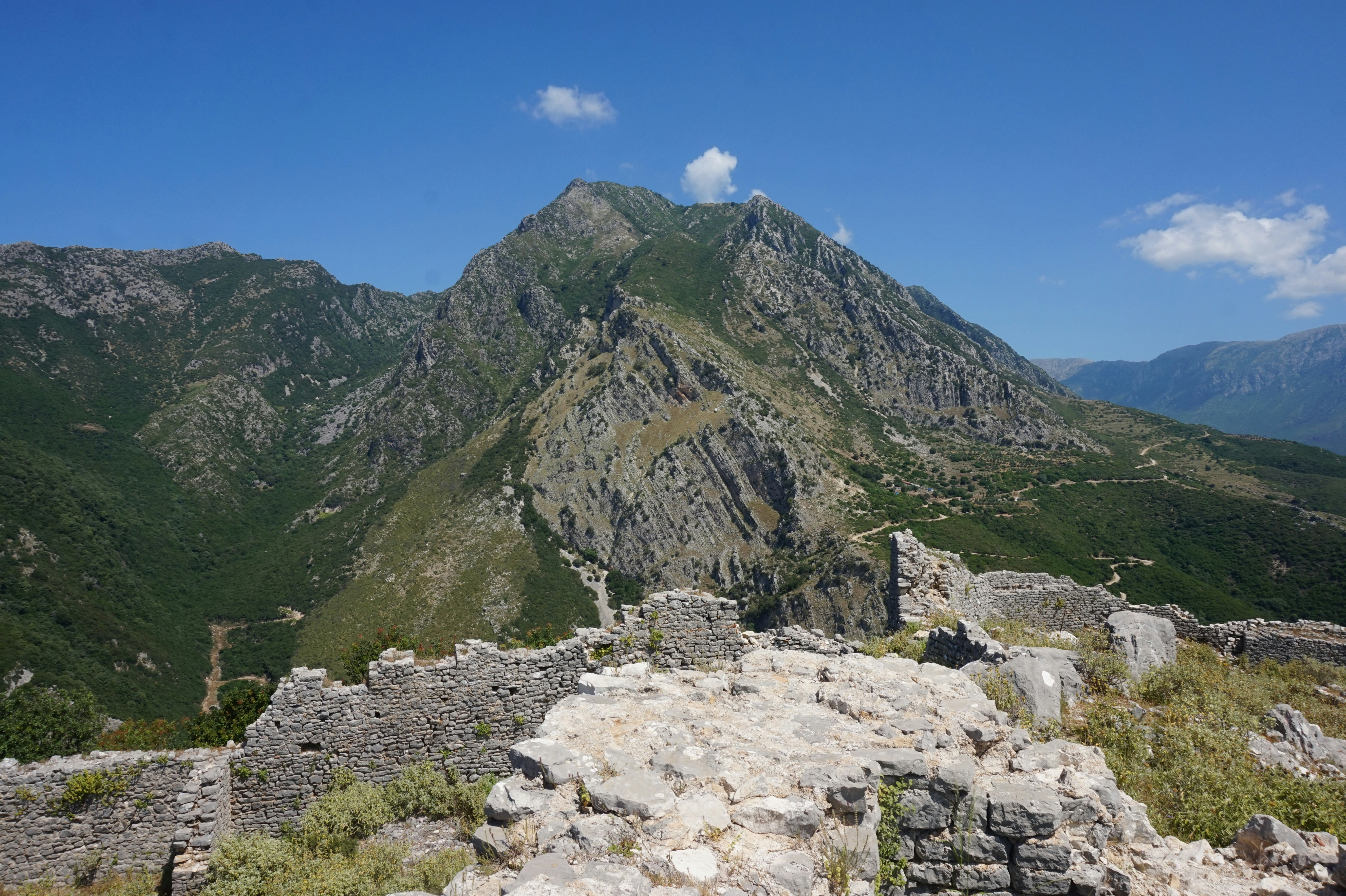 Mountain and old-town landscape associated with olive-growing hills above Himara
