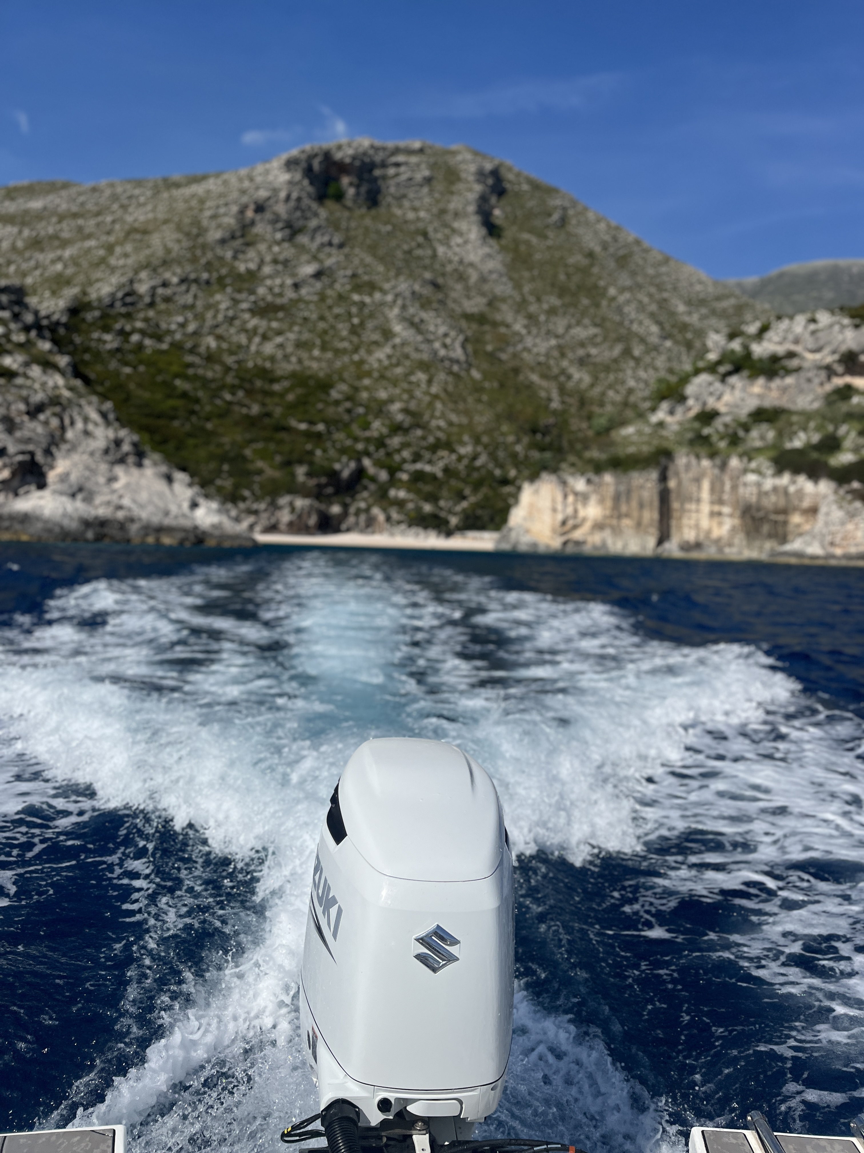 Aerial view of Gjipe Canyon meeting the sea along the Albanian Riviera coastline