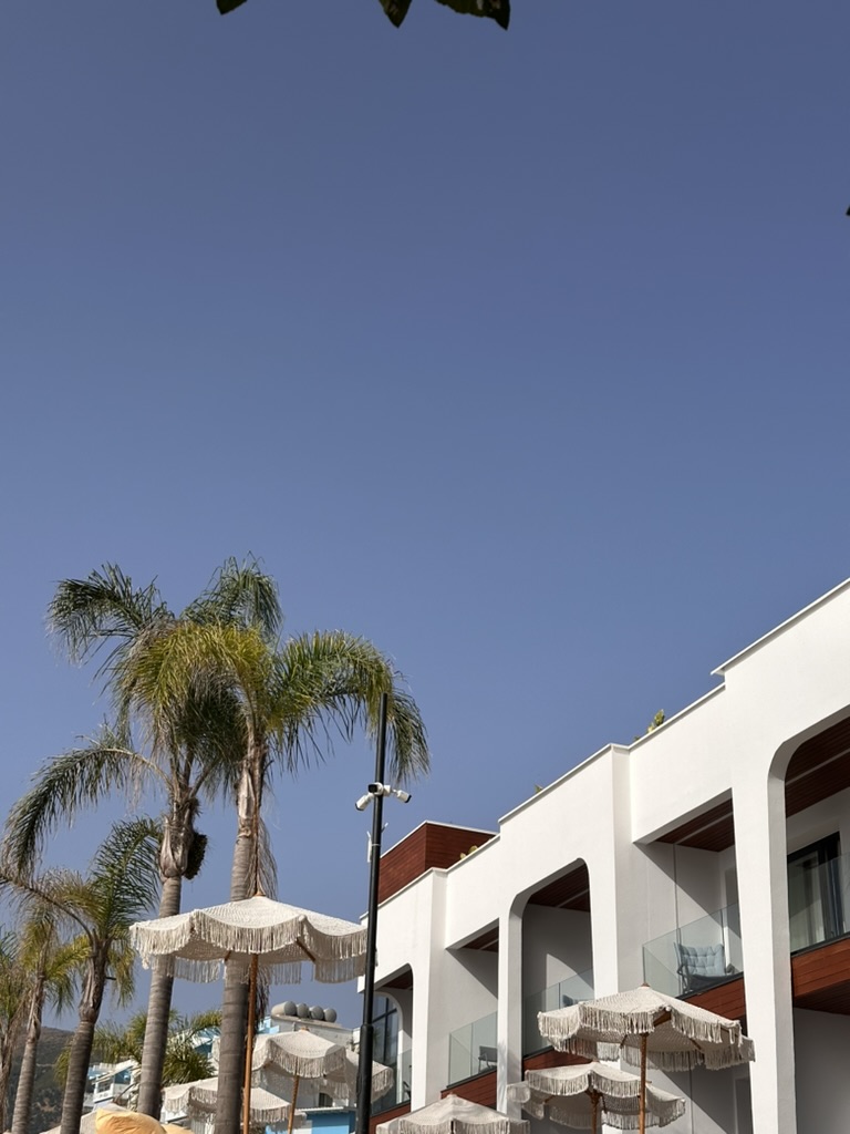 Mountain road at sunset on the route from Himara toward inland Albania
