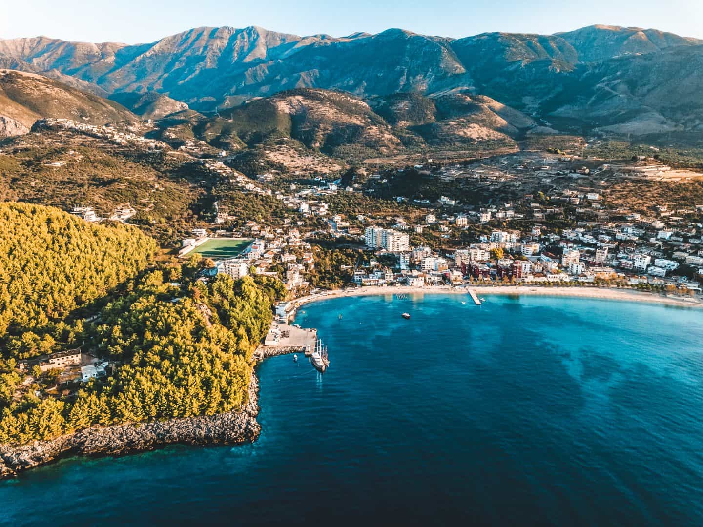 Aerial view of the Albanian Riviera coast with peninsula and bay accommodation areas