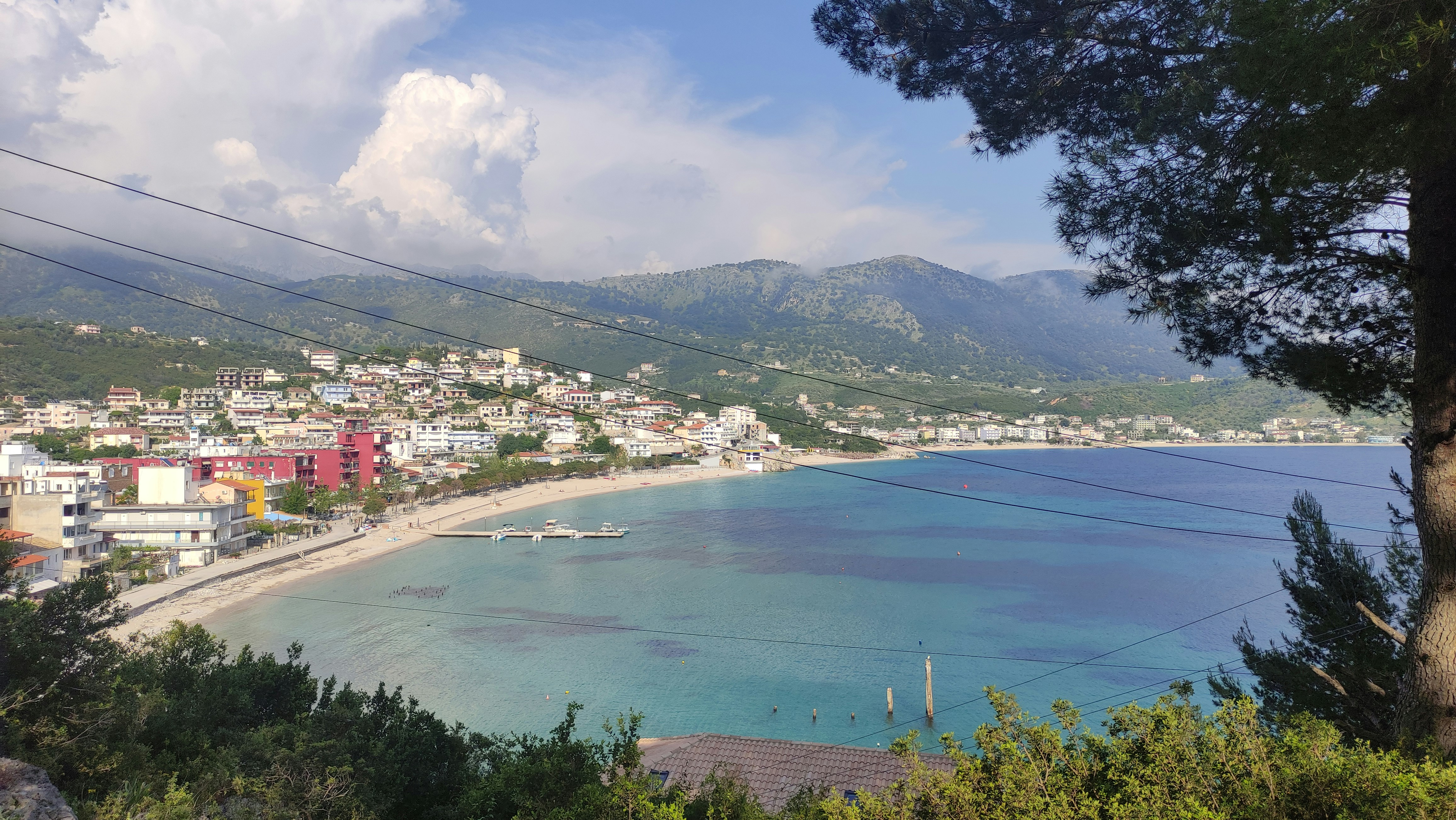 Elevated view of Himara town and Spile Beach bay
