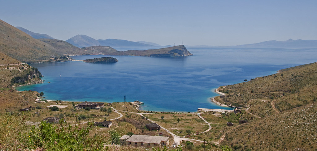 High angle view of Himara Spile beach and walkable promenade area