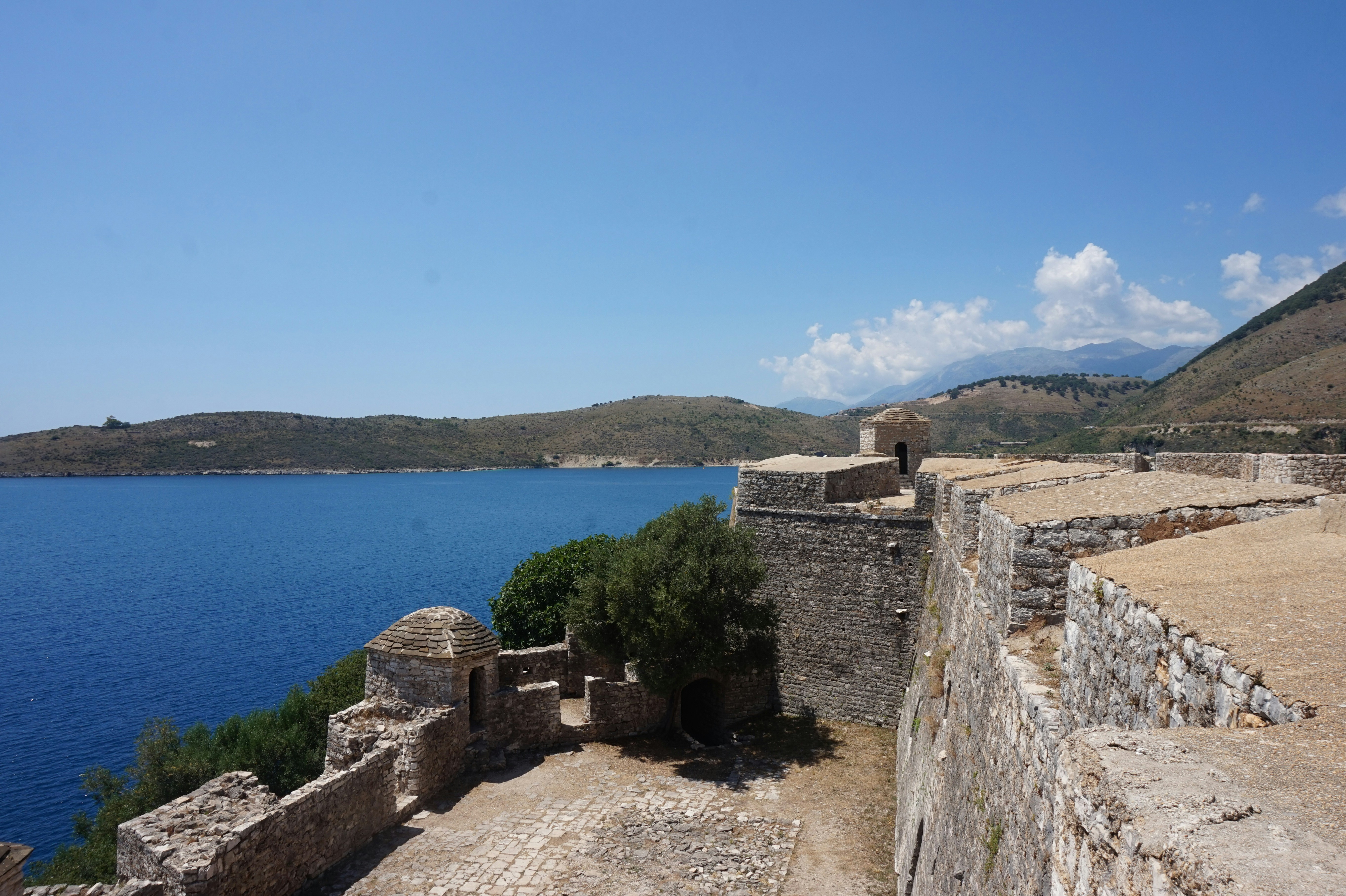 Porto Palermo castle walls overlooking the bay and surrounding hills
