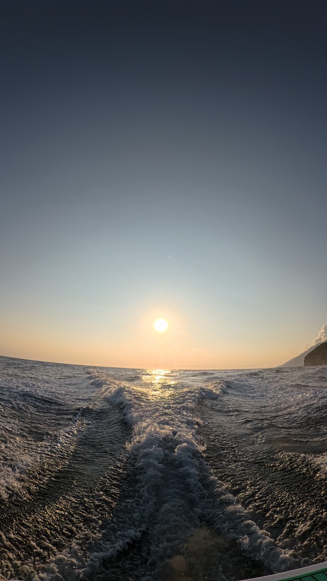 Romantic sunset over the Ionian Sea from a boat near Himara