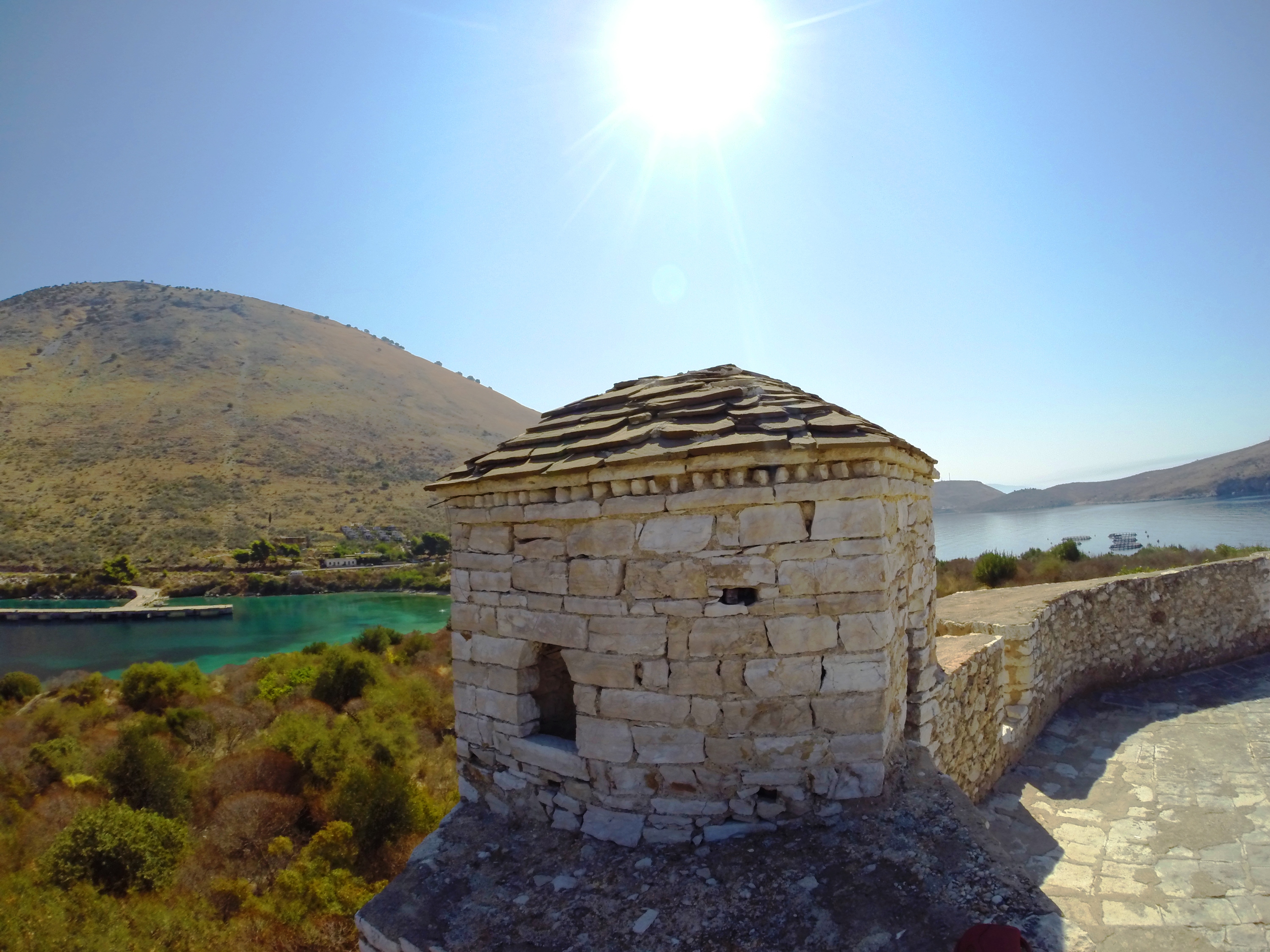 Porto Palermo Castle on its peninsula overlooking the turquoise bay
