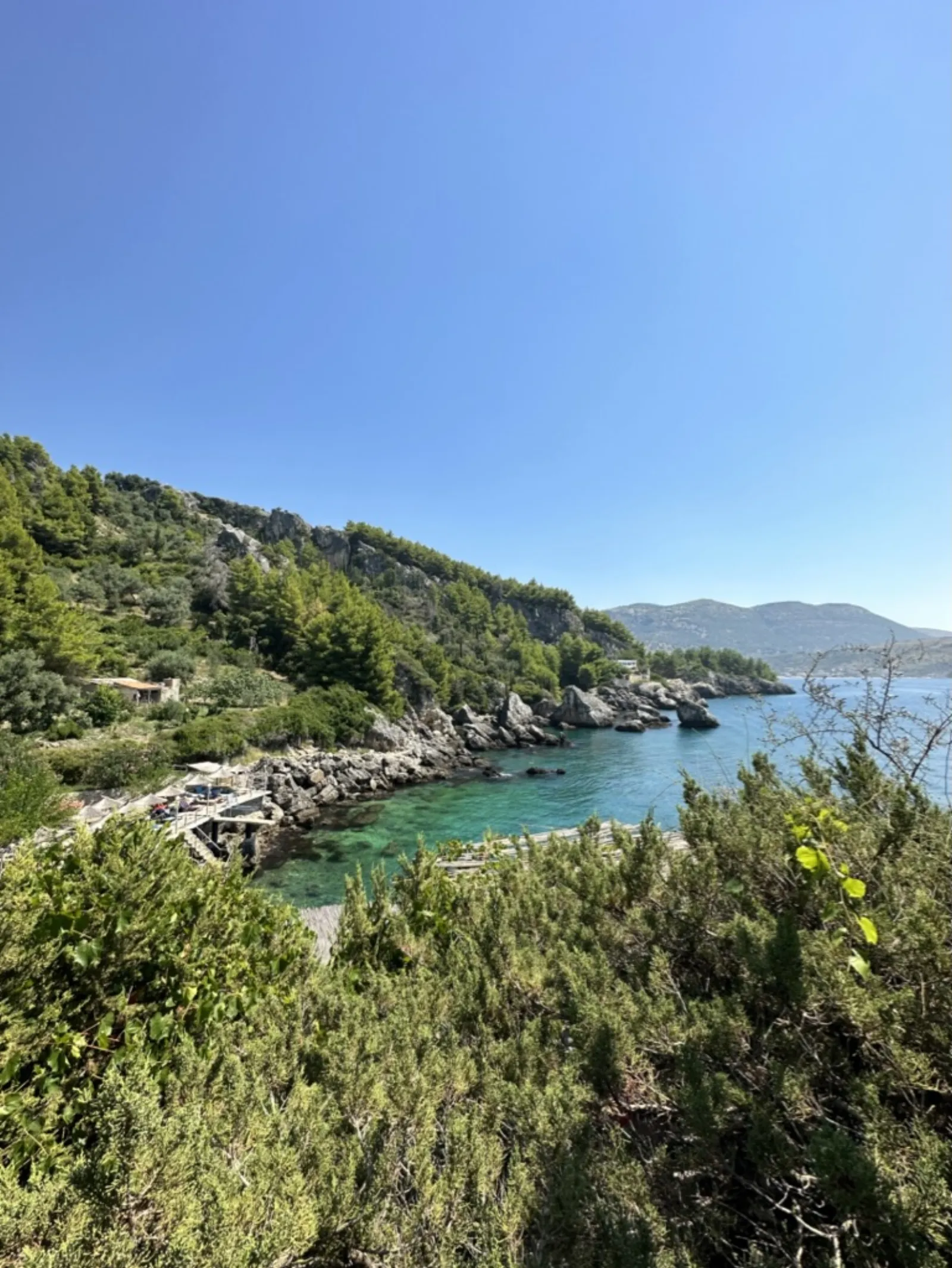 Himara town at sunset — accommodation market context for the Airbnb vs Booking decision in Albania