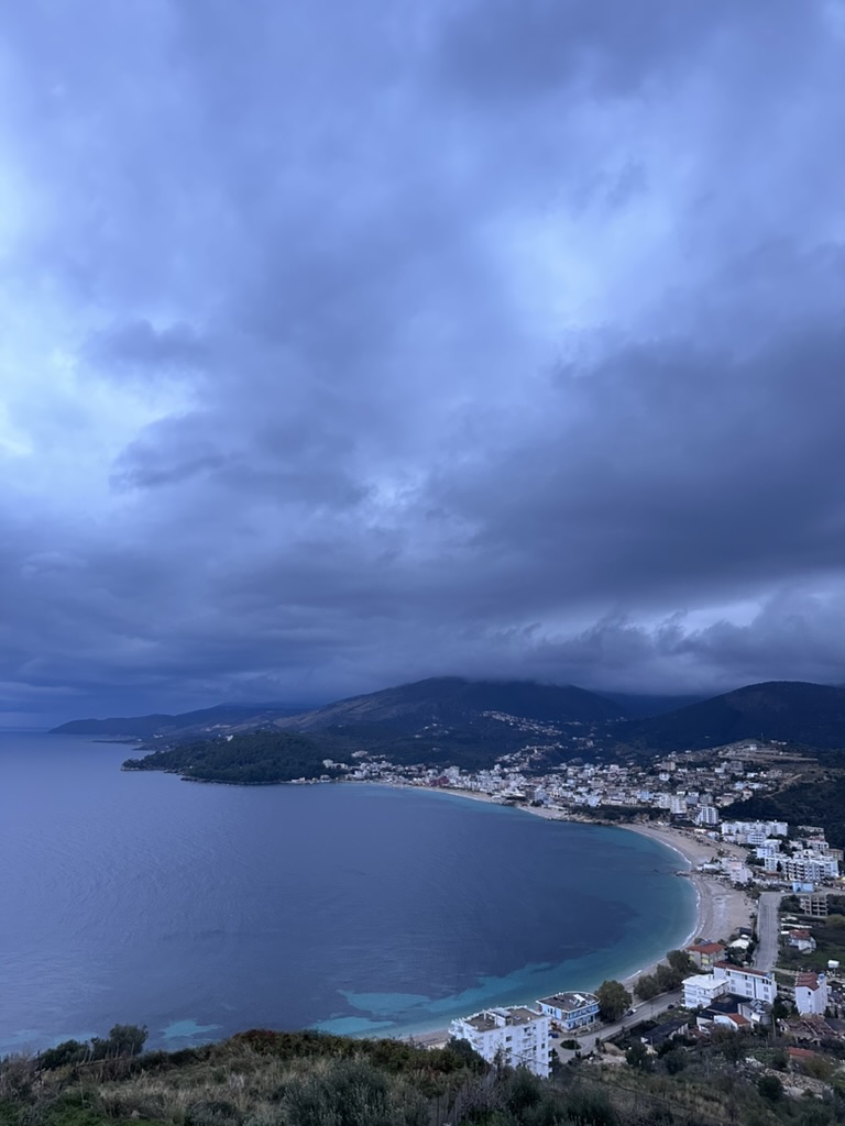 Aerial view of Himara town showing road access and coastal layout