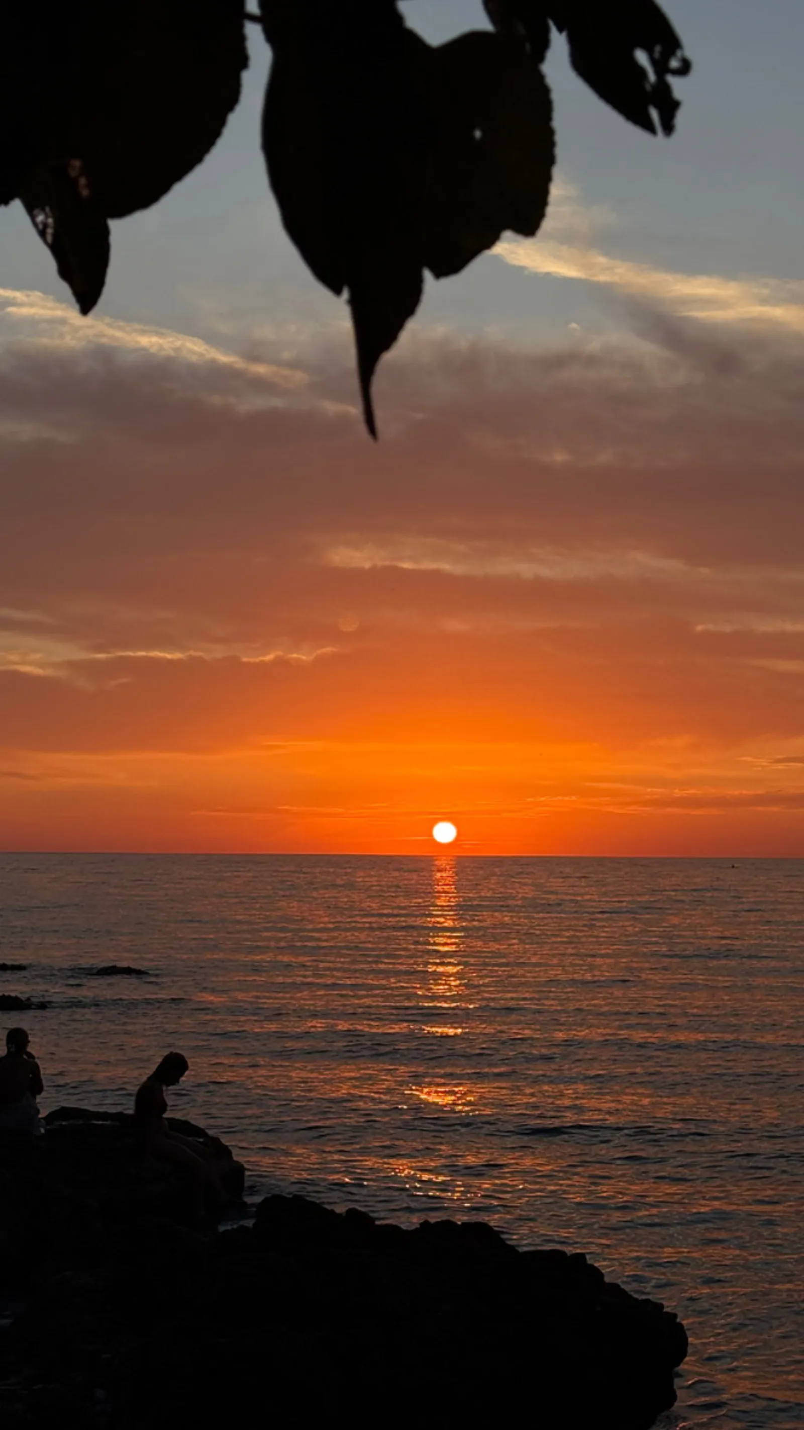 Overcast late-day sky over Spile beach in Himara — typical Albanian Riviera transitional-season weather