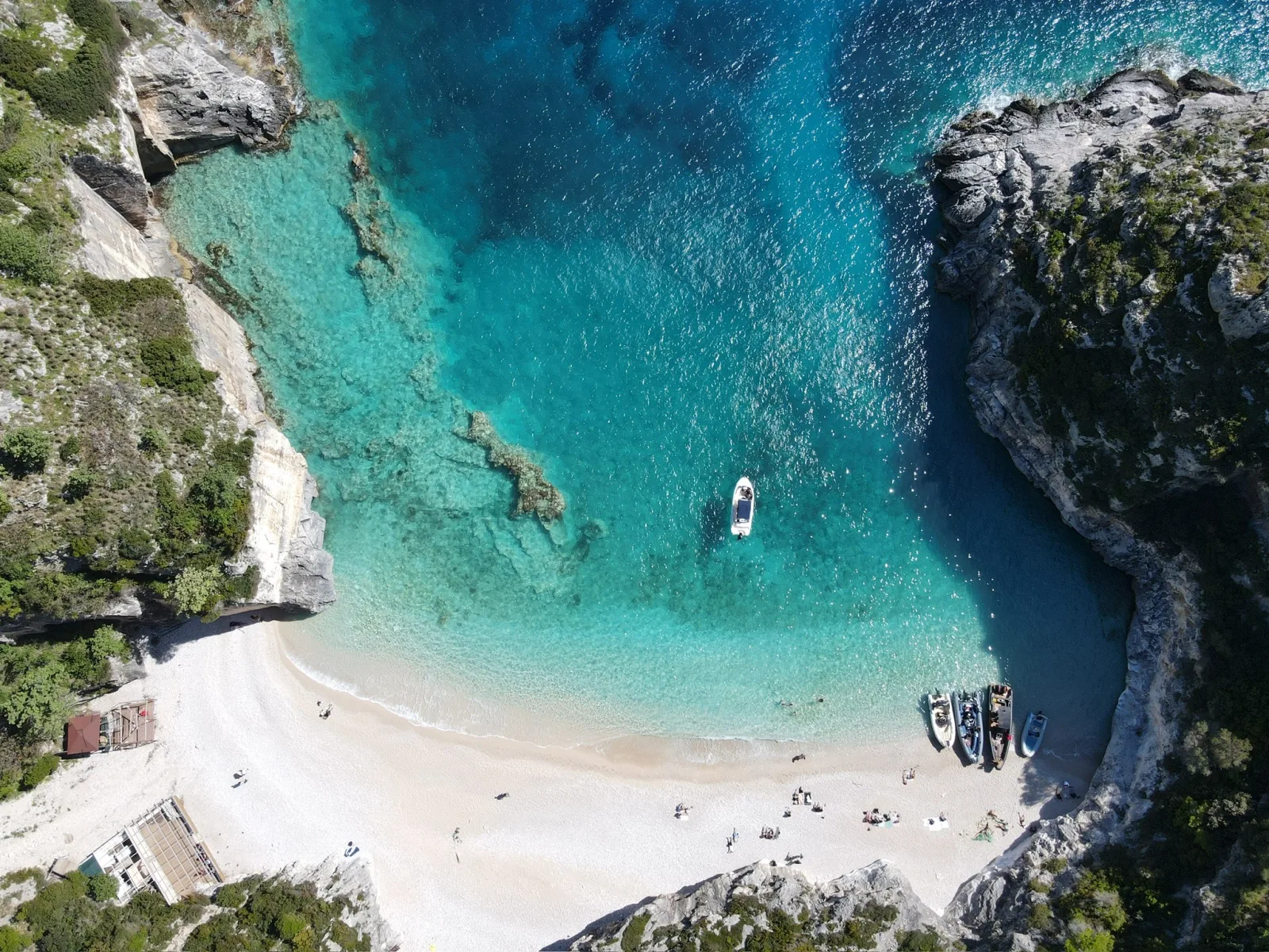 Turquoise Ionian cove on the southern Albanian coast near Saranda — is saranda worth visiting