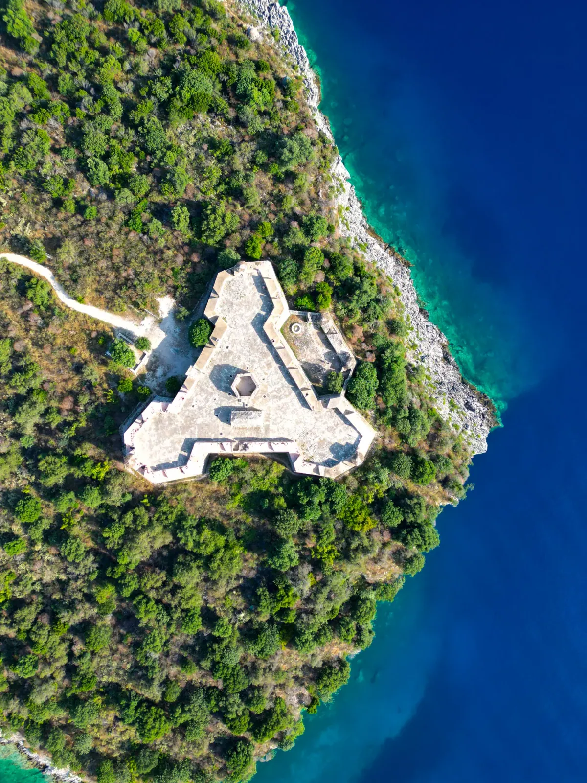Aerial view of Porto Palermo Bay with Ali Pasha's castle on the central peninsula