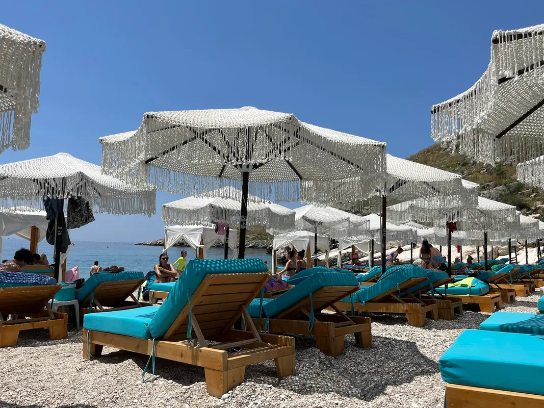 Colorful bean bags at Mumbas Beach Club on the secluded Llaman Beach
