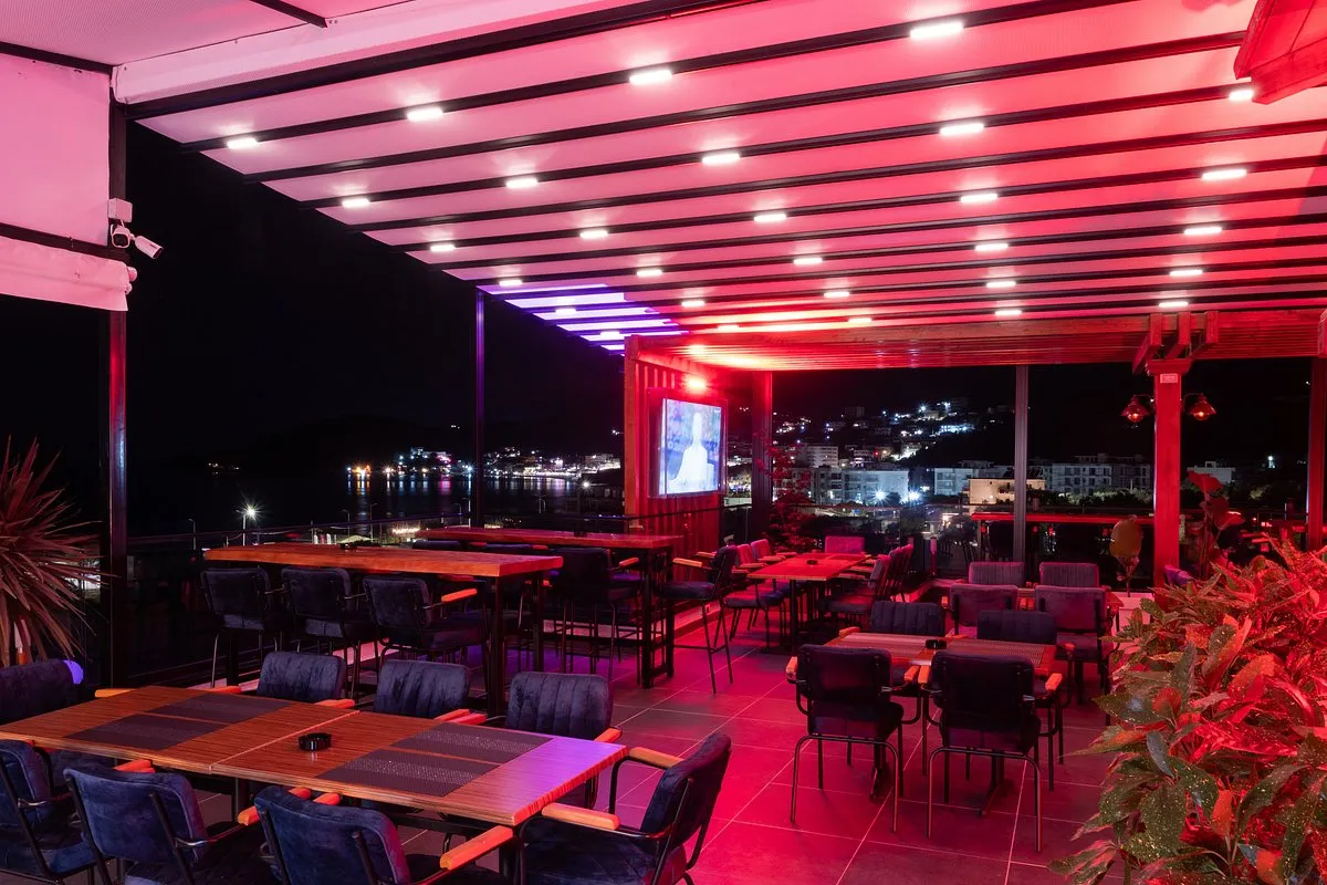 Evening DJ set at Rooftop Nia Boutique with panoramic sea views