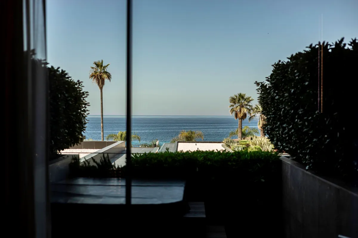 Infinity pool at Prado Luxury Hotel overlooking Potam Beach and the Ionian Sea