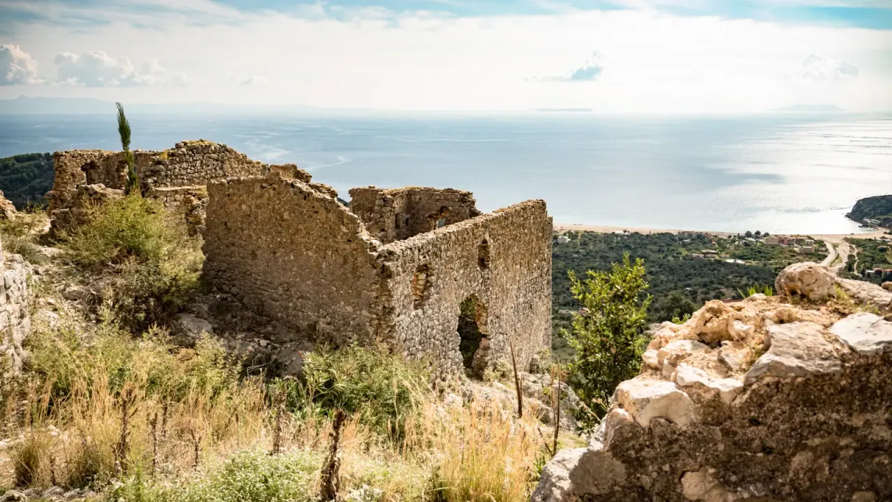 Aerial view of Himara castle ruins and the Albanian Riviera coastline